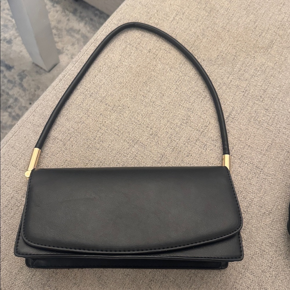 Black Leather Handbag with Gold Accents
